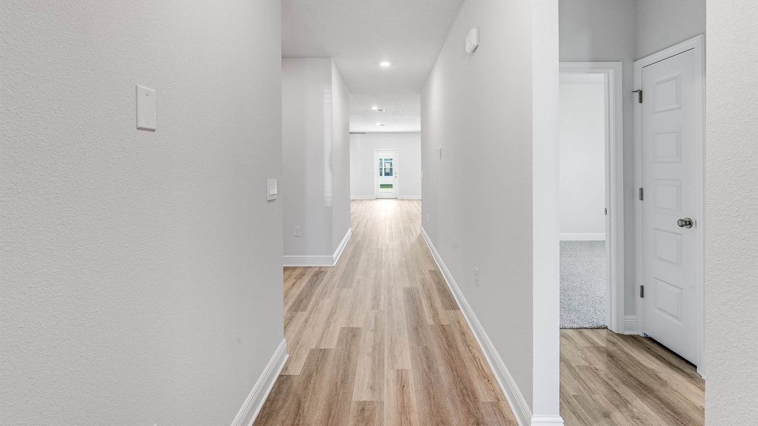 Representative unfurnished interior of a home built from the The Delray by D.R. Horton in Buffer Farms, Port Saint Joe (Image 11).