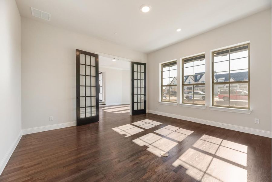 Representative unfurnished interior of a home built from the Hampton III by Grand Homes in Whitestone Estates, Parker (Image 21).