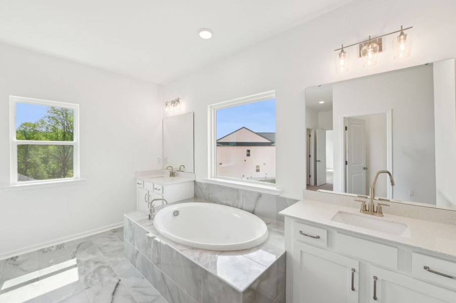 Furnished interior in a model home at Rowland's Grant in Fuquay Varina (Image 3).