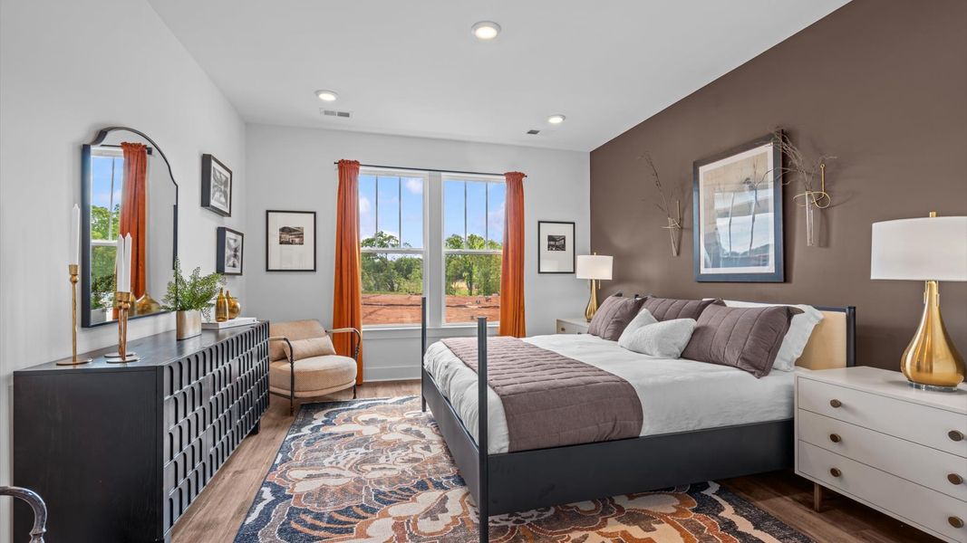 Primary suite that offers first-rate relaxation with established style and elevated finishes at the Barton Hollow community
