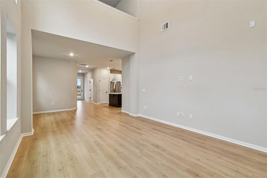 Spacious, unfurnished interior of a new home in Laureate Park at Lake Nona - Garden Series, Orlando (Image 32).