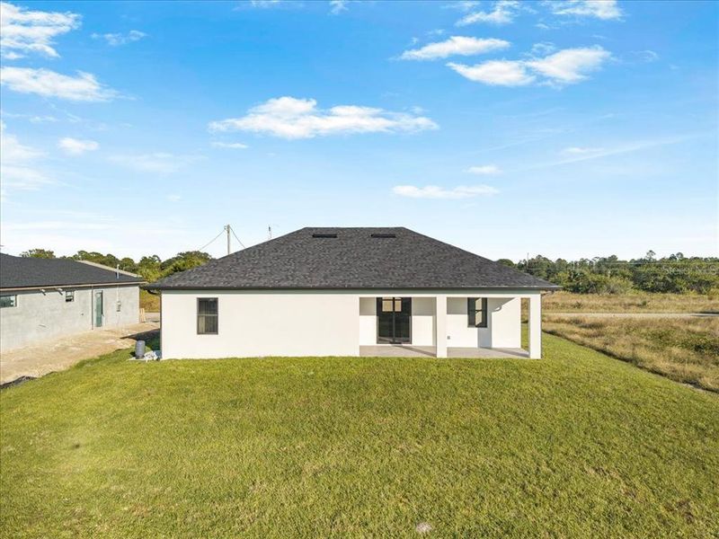 Exterior details and patio area of a home in , Lehigh Acres (Image 14).