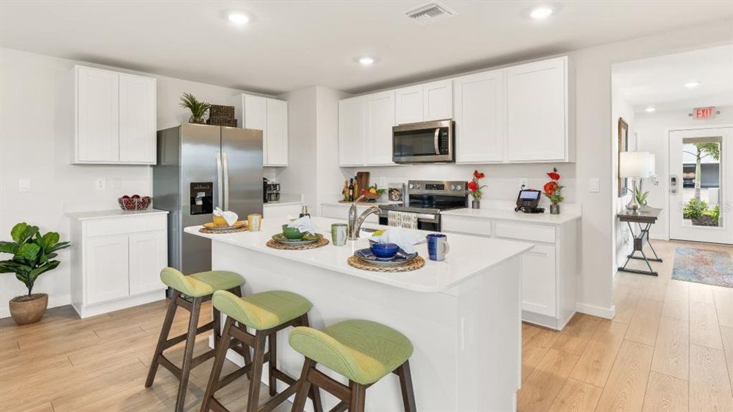 Furnished interior view inside a new home in Driftwood Bay, Port Charlotte (Image 7).