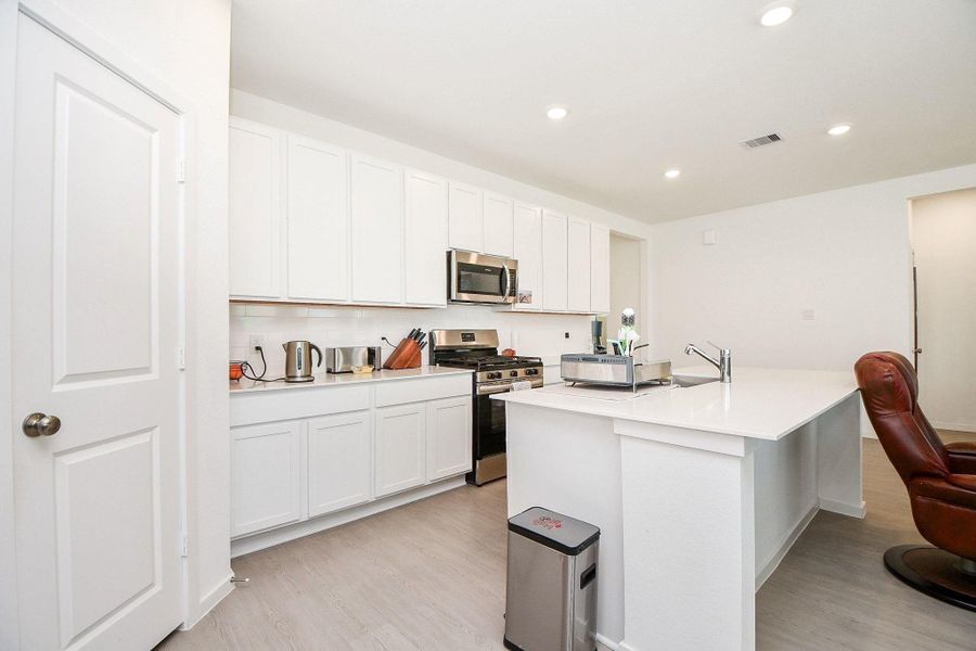 Furnished interior view inside a new home in Anniston, Katy (Image 12). Furnished interior view inside a new home in Anniston, Katy (Image 12).
