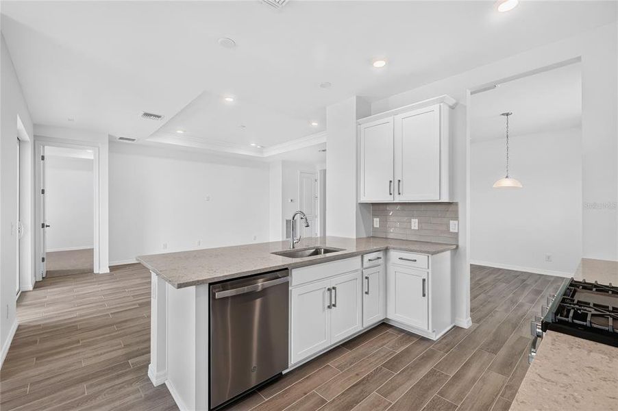 Furnished interior view inside a new home in The Sanctuary – Resort Collection, Punta Gorda (Image 6).