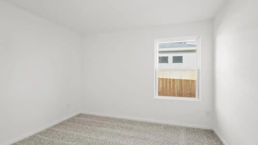 Spacious, unfurnished interior of a new home in The Canopies, Splendora (Image 14).