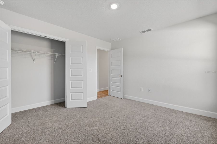 Spacious, unfurnished interior of a new home in Hill Country Estates, Dade City (Image 22).