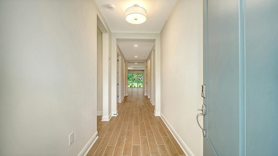 Spacious, unfurnished interior of a new home in Grand Park Real Estate and Homes for Sale in Sarasota, FL - Neal Communities, Sarasota (Image 22).
