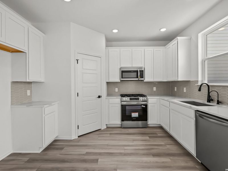 Furnished interior view inside a new home in Meadows at Oak Creek, San Antonio (Image 5).