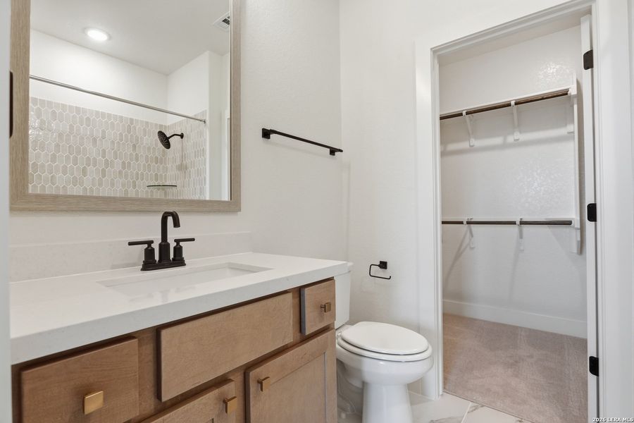 Furnished interior view inside a new home in Enchanted Bluff, San Antonio (Image 19).