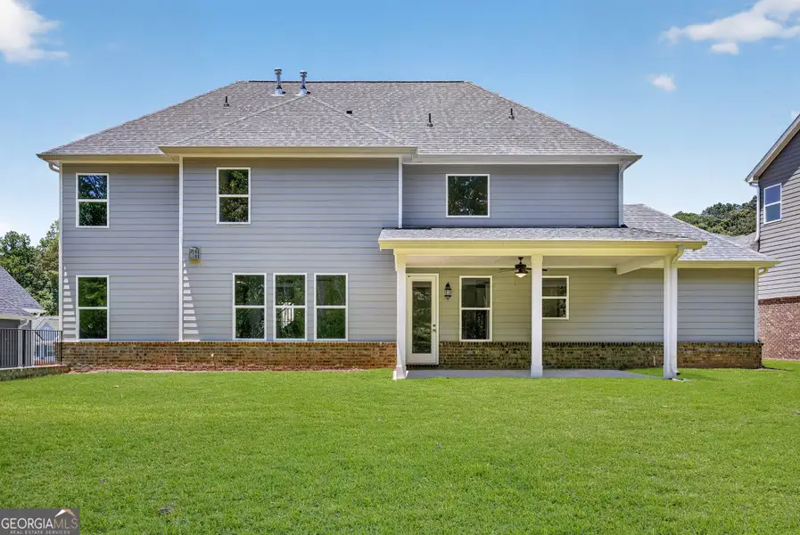 Exterior details and patio area of a home in The Manor at Gainesville Township, Gainesville (Image 19).