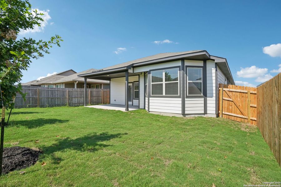 Front exterior of a new home in Catalina, Converse, TX, highlighting curb appeal (Image 19).
