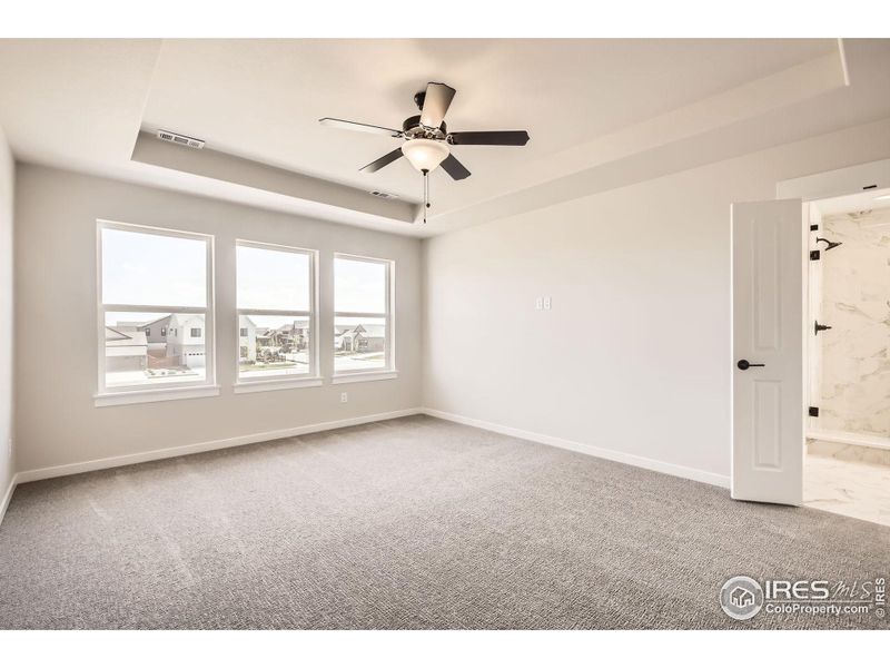 Spacious, unfurnished interior of a new home in RainDance National 60/70, Windsor (Image 27).