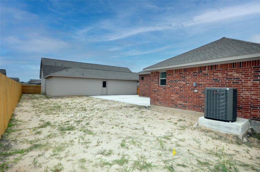 Rear yard from behind the home.