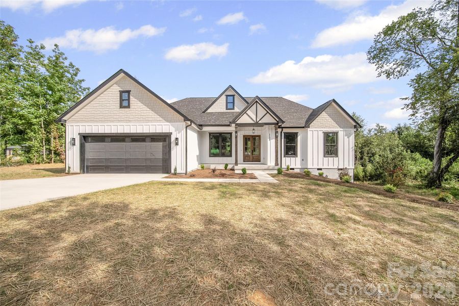 Front exterior of a new home in , Kannapolis, NC, highlighting curb appeal (Image 24).