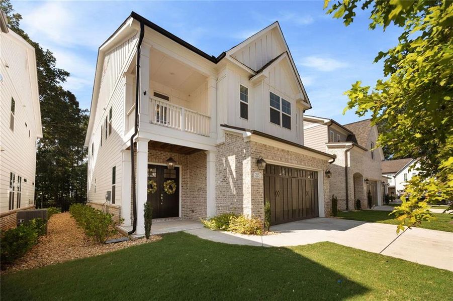 Front exterior of a new home in , Marietta, GA, highlighting curb appeal (Image 2). Front exterior of a new home in , Marietta, GA, highlighting curb appeal (Image 2).