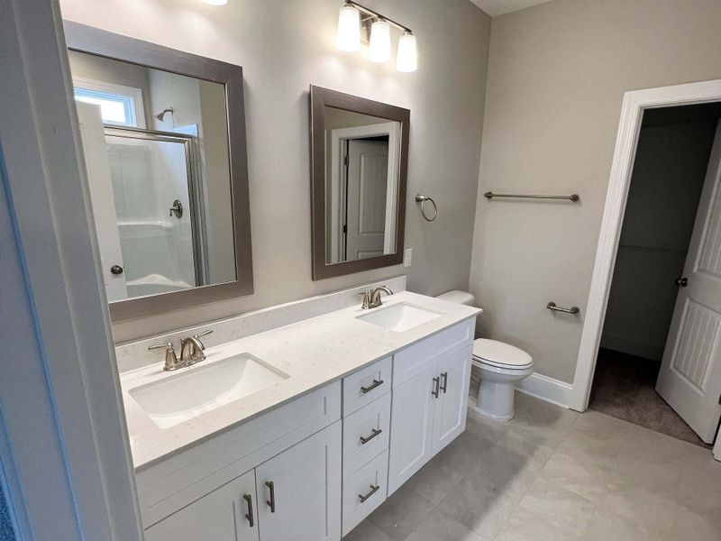 Representative furnished interior of a home built from the Carver by Caviness & Cates Communities in Maggie Way, Wendell (Image 42).