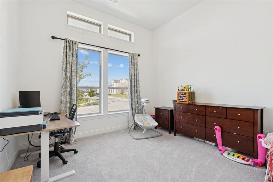 Office area with light carpet Office area with light carpet