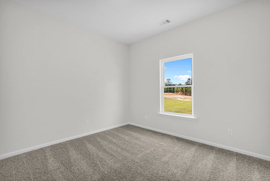 Representative unfurnished interior of a home built from the The Magnolia by Smith Family Homes in Sweetwater, Brunswick (Image 27).