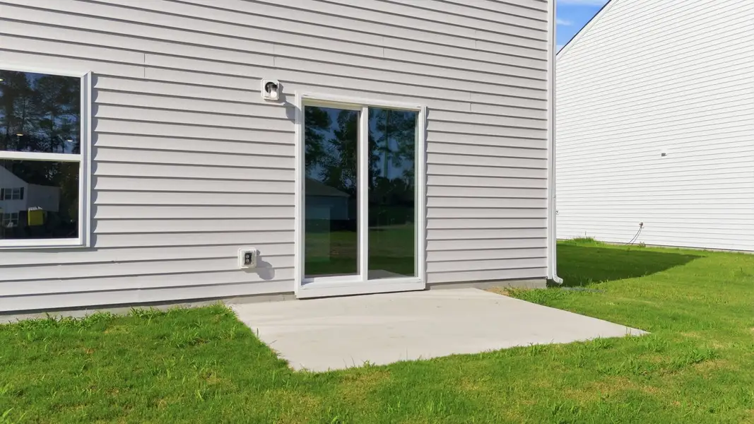 Exterior details and patio area of a home in Jetstream Park, Wilson (Image 4).