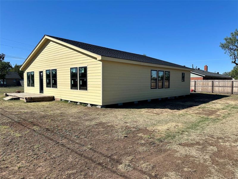 Exterior details and patio area of a home in , Tye (Image 3).