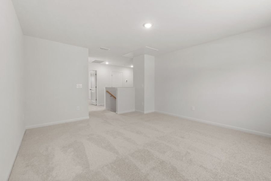 Spacious, unfurnished interior of a new home in Wimberly, Willow Spring (Image 25).