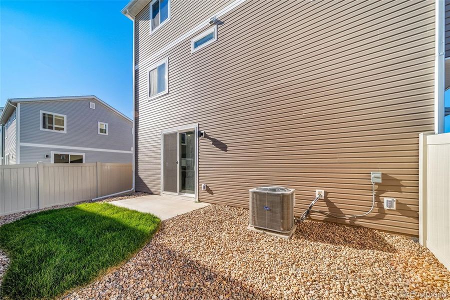 Exterior details and patio area of a home in Muegge Farms, Bennett (Image 4).