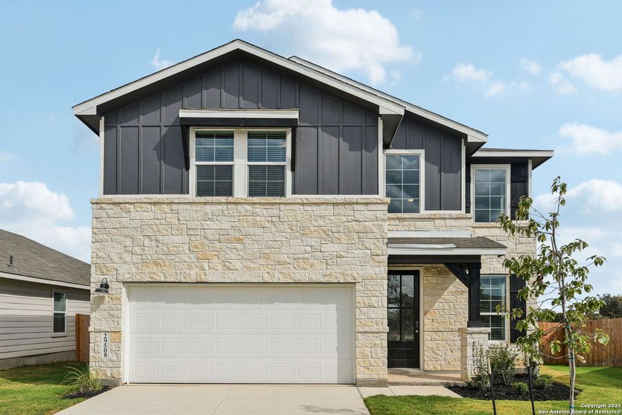 Front exterior of a new home in Estancia Ranch - Premier Series, San Antonio, TX, highlighting curb appeal (Image 2). Front exterior of a new home in Estancia Ranch - Premier Series, San Antonio, TX, highlighting curb appeal (Image 2).