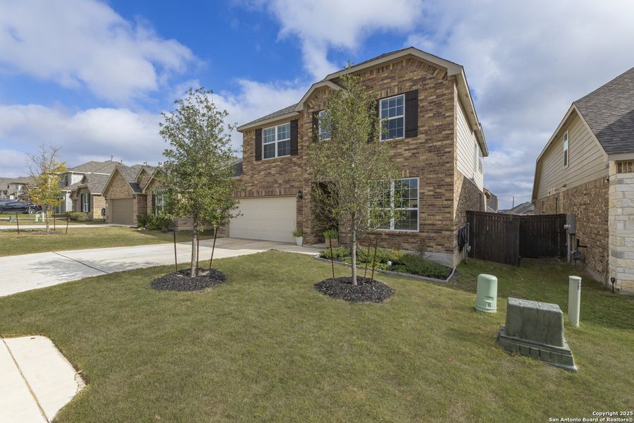 Front exterior of a new home in , San Antonio, TX, highlighting curb appeal (Image 1). Front exterior of a new home in , San Antonio, TX, highlighting curb appeal (Image 1).