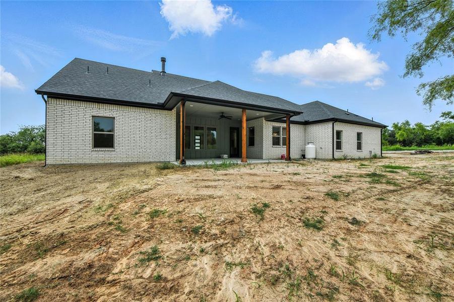 Front exterior of a new home in , Weatherford, TX, highlighting curb appeal (Image 20). Front exterior of a new home in , Weatherford, TX, highlighting curb appeal (Image 20).