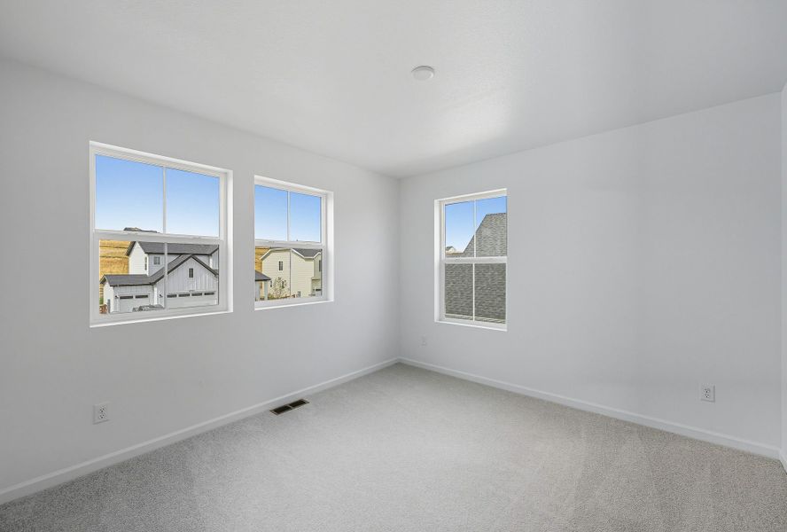 Spacious, unfurnished interior of a new home in The Town Collection at Independence, Elizabeth (Image 14).