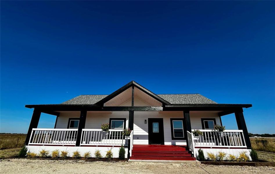 Bungalow-style house with a porch Bungalow-style house with a porch