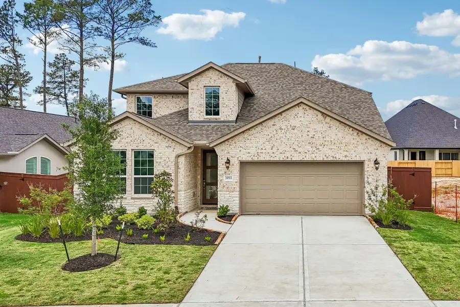Front exterior of a new home in , Magnolia, TX, highlighting curb appeal (Image 1). Front exterior of a new home in , Magnolia, TX, highlighting curb appeal (Image 1).