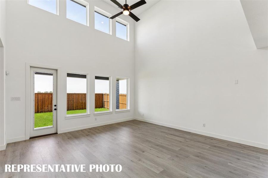 Our Rochelle plan offers a family room large enough to host the entire family!  REPRESENTATIVE PHOTO