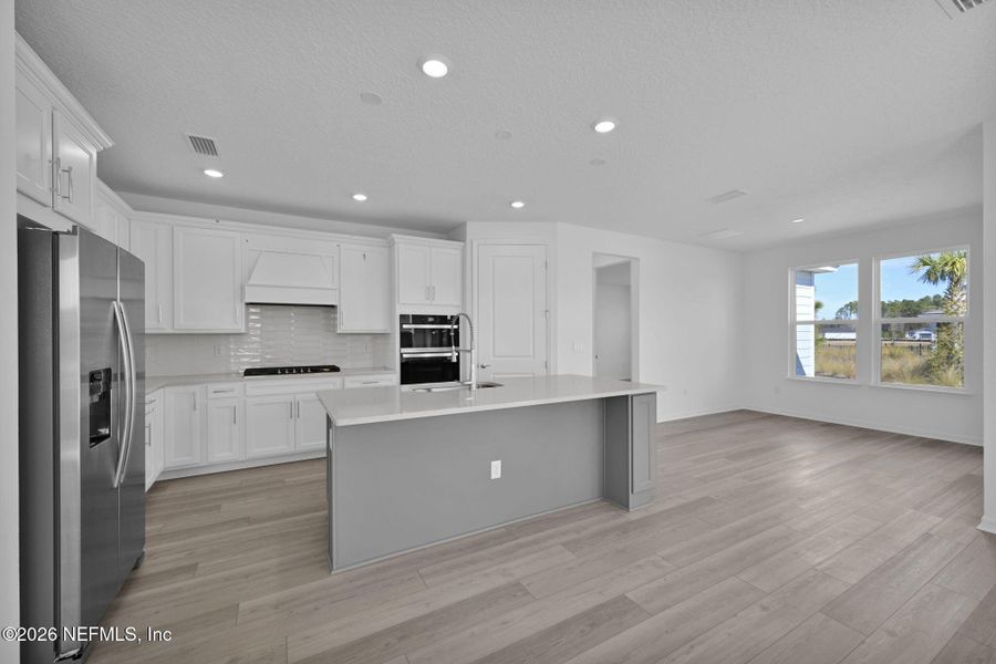 Furnished interior view inside a new home in Del Webb Wildlight, Yulee (Image 13).