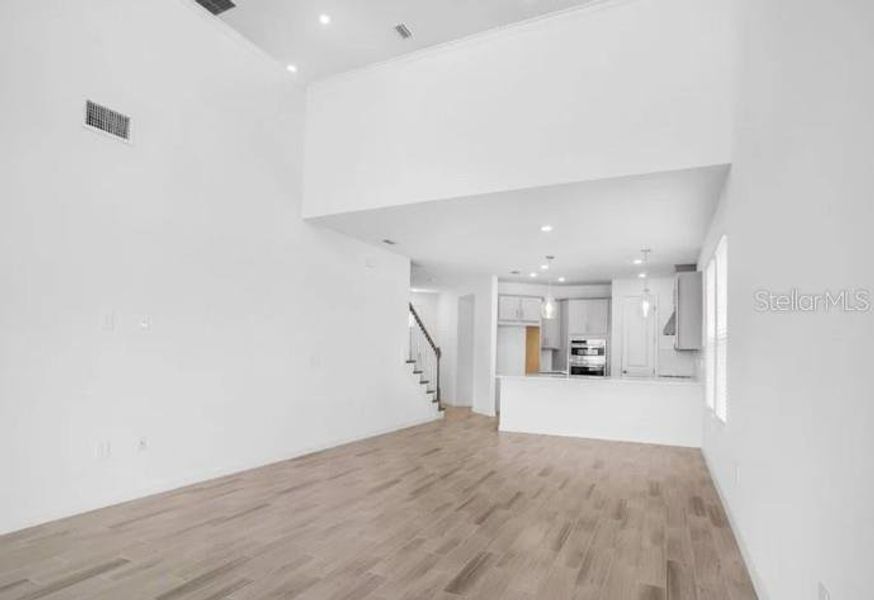 Spacious, unfurnished interior of a new home in Center Lake Ranch Community Group Page, St. Cloud (Image 12).