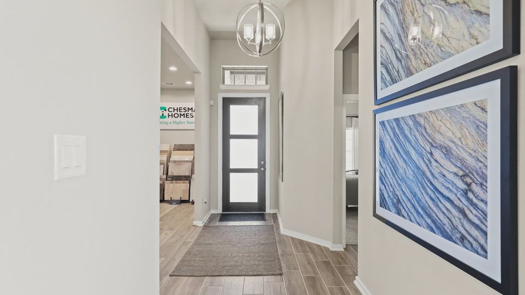Representative furnished interior of a home built from the Oxford by Chesmar Homes in Bridgeland 45's, Cypress (Image 4).