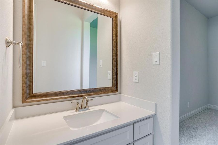 Bathroom featuring vanity