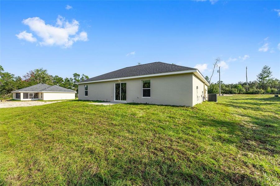 Exterior details and patio area of a home in , Ocala (Image 33).