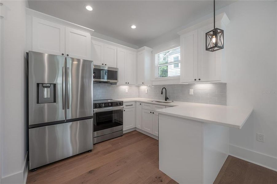 Furnished interior view inside a new home in , Tampa (Image 12). Furnished interior view inside a new home in , Tampa (Image 12).