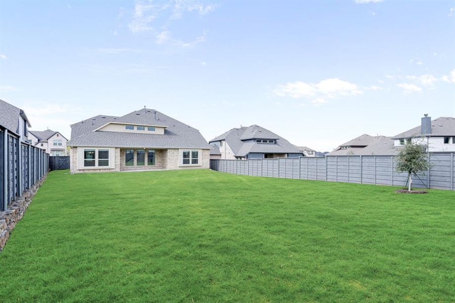 Exterior details and patio area of a home in Union Park Classic 60, Little Elm (Image 3). Exterior details and patio area of a home in Union Park Classic 60, Little Elm (Image 3).