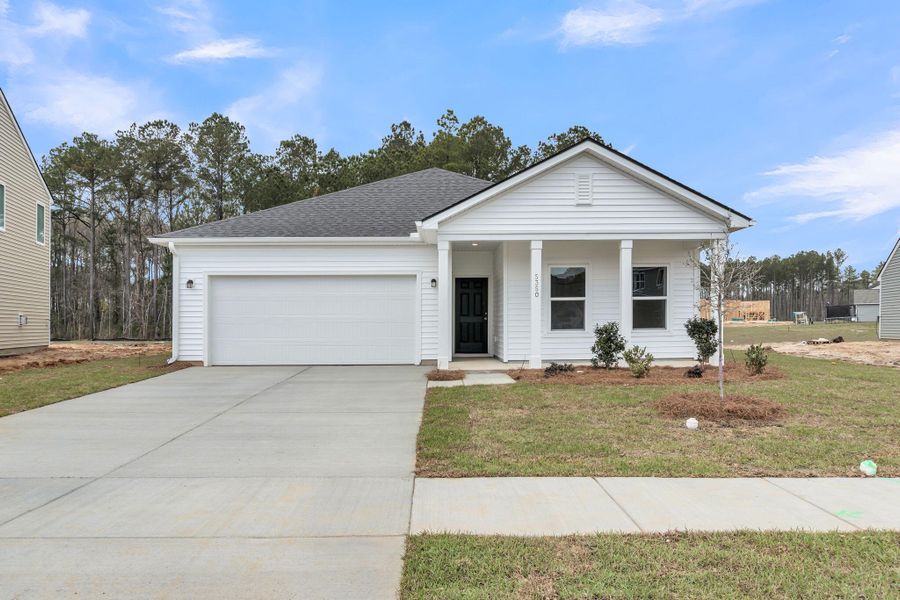 Front exterior of a new home in , Summerville, SC, highlighting curb appeal (Image 1). Front exterior of a new home in , Summerville, SC, highlighting curb appeal (Image 1).