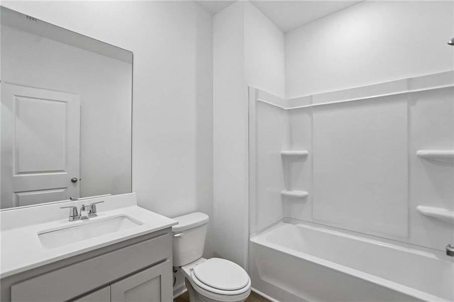 Furnished interior view inside a new home in The Pointe at Heron Bay, Locust Grove (Image 9).