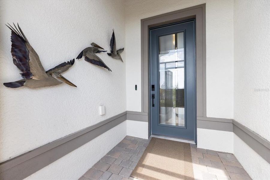 Exterior details and patio area of a home in , Englewood (Image 4).