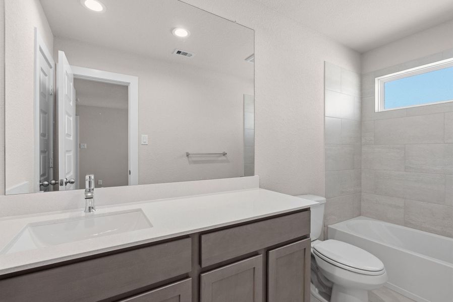 Furnished interior view inside a new home in Barton Creek Ranch, Conroe (Image 7). Furnished interior view inside a new home in Barton Creek Ranch, Conroe (Image 7).