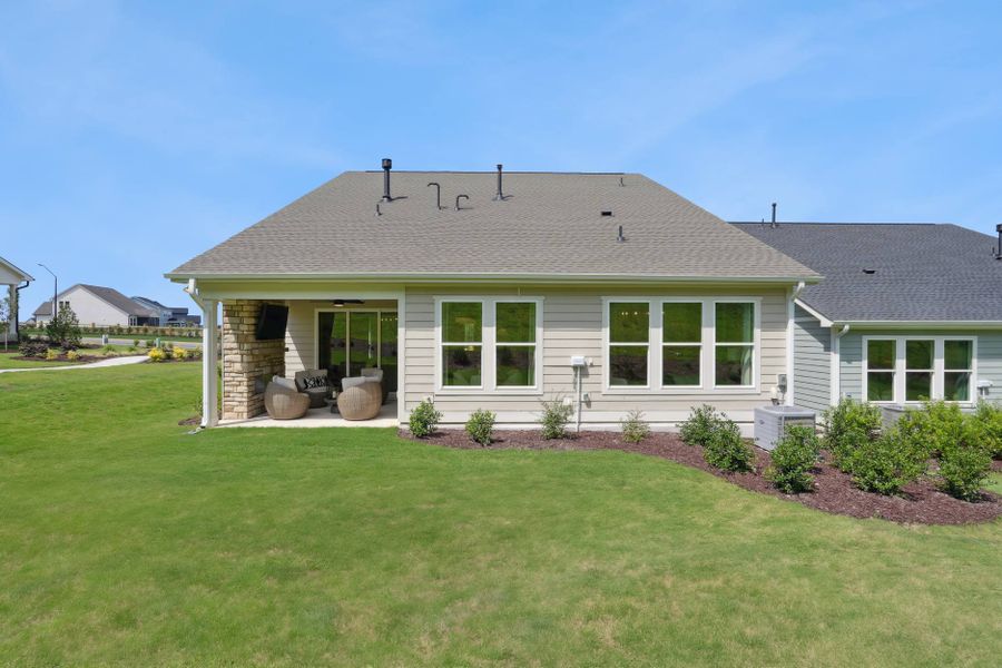 Representative exterior photo of a completed home built from the Sandy Lane by Tri Pointe Homes in The Pines Collection at Serenity, Fuquay Varina, NC (Image 2).