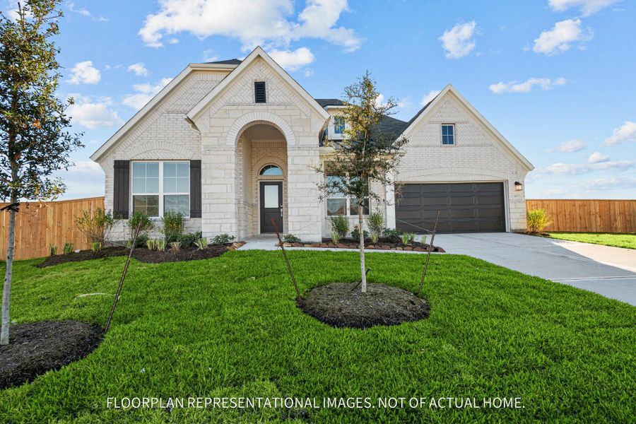 Front exterior of a new home in The Oaks on 6th Street, Magnolia, TX, highlighting curb appeal (Image 1).