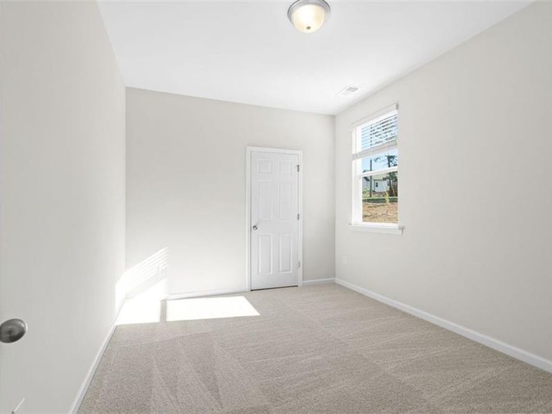 Spacious, unfurnished interior of a new home in Wehunt Meadows, Hoschton (Image 23).