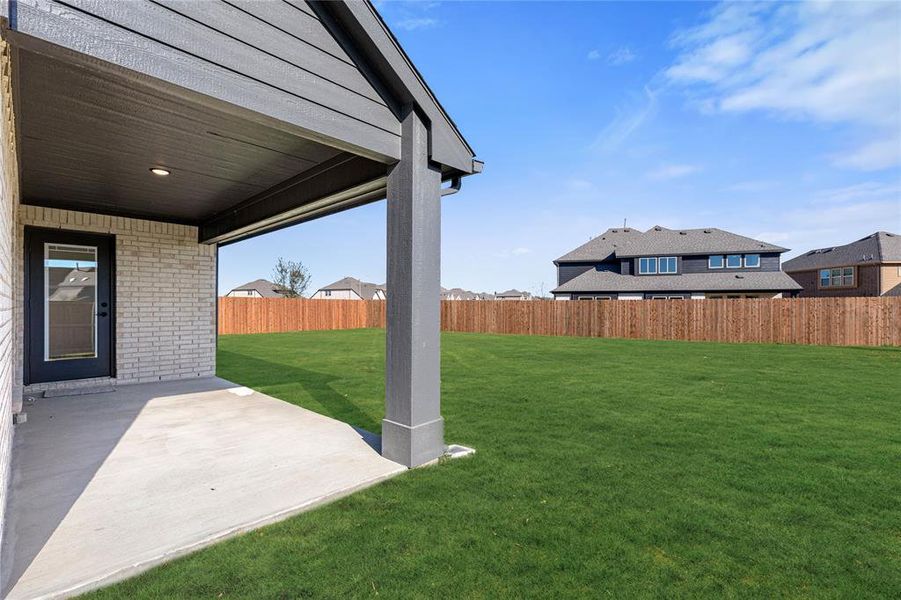 Exterior details and patio area of a home in Wildflower Ranch 60-65, Fort Worth (Image 3). Exterior details and patio area of a home in Wildflower Ranch 60-65, Fort Worth (Image 3).
