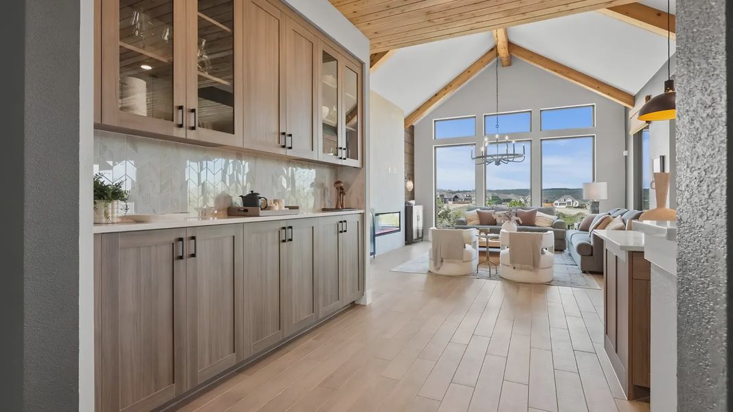 Representative furnished interior of a home built from the Melody by Chesmar Homes in Newhaven, Manor (Image 7).